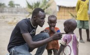*Aaden, Nutrition Nurse with Concern's South Sudan partner, Nile Hope, with some children in Unity State. Photo: Kieran McConville/Concern Worldwide.