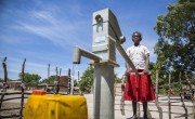 15 year old Liliana Mwenza wa llunga says the new water point and other interventions by the Concern-led WASH consortium in her village, Mulombwa, has had a very positive impact on family life. DRC. Photo: Kieran McConville/ Concern Worldwide