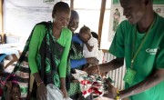 Concern staff give out PlumpyNut to the parents of malnourished babies and children, South Sudan. Photo: Abbie Trayler-Smith