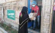 Hamida* receiving Nutritional Supplement for her malnourished child from a Concern supported Nutrition site, Cox’s Bazar.