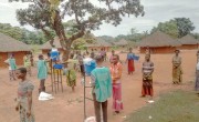 People observe social distancing and wash their hands before receiving distributions in Kasai Province, DRC. Photo: Elysée Muadi Nyembwe