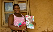 Janet Bosko Jasad receives soap and Covid-19 fliers as part of a Concern Worldwide distribution.