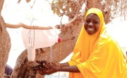 Hadiza demonstrations good hand washing technique she was taught at a Covid-19 awareness and soap distribution in Tahoua, Niger. Photo: Marie Rabo
