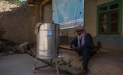 Village elder Edris*, 60, washes his hands as preventative measure to the spread of Covid-19. Photo: Stefanie Glinski