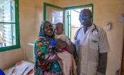 A Concern doctor with Jasim*. His mother Nayla* brought him to the Concern supported clinic after he stopped eating. He has since reached a healthy weight. Photo: Gavin Douglas