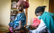Mother Chuluke Tuye with her baby having a check-up in Marsabit County, Kenya. Photo: Ed Ram