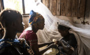 Nurse Leonie Kamono, 37, at Kiambi Heath centre, Manono Territory, as she speaks to new mother Feza Mwamba, who just gave birth at the centre. Photo: Hugh Kinsella Cunningham/Concern Worldwide
