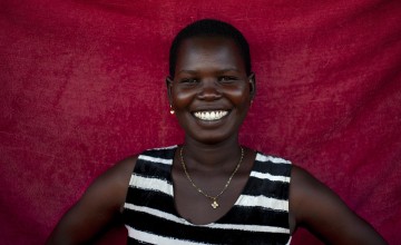 Idil* lives with her three children in a POC in Juba, South Sudan. Today she is cooking Kisro (paper food). Photo: Abbie Trayler-Smith