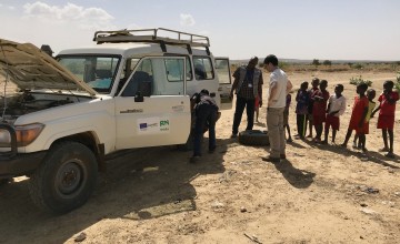 The Concern team stop to fix a puncture. Photo: Darren Vaughan/Concern Worldwide.