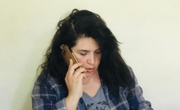 Siba Bizri, Concern’s Case Management Officer in Lebanon, answers calls to the hotline for gender-based violence. Photo: Concern Worldwide.
