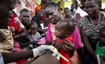 People gather for a Concern Worldwide nutrition clinic, South Sudan. Photo: Abbie Trayler-Smith