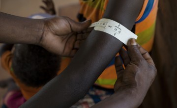 A mother being screened for malnutrition at a Concern clinic