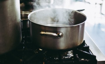 A silver pan on a hob