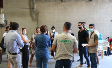 Volunteering groups are meeting each other in the warehouse to discuss and plan their response to the Beirut blast. Photo: Jade van Huisseling
