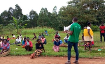 Gilbert Reberaho delivers awareness sessions on Covid-19 prior to distributing face masks, Rwanda Photo: Gaspard Uwumukiza