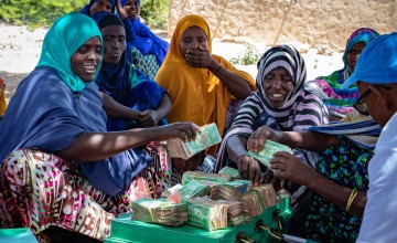 A self-help group count their profits. Concern provided a start-up grant and training for these women and now they run a successful business. Photo: Gavin Douglas