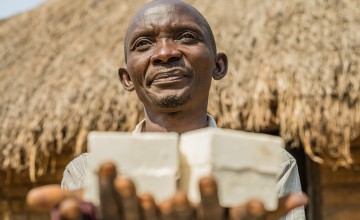 Mususa has been blind since he was forty and is the head of his household. Mususa runs his businesses with the help of his son, Joseph, selling homemade soap, cassava and palm oil, which he