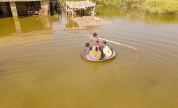 14-year-old Aqib rescues people stranded in flood waters in Sindh, Pakistan.