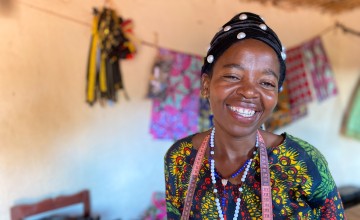 Alexia Mukashyaka runs a successful tailoring business in a small workshop in her village, after partnering with Concern.