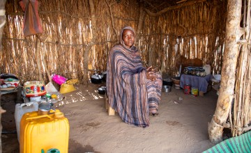 Dijda* (20) in her kitchen area in refugee camp in Eastern Chad. Dijda* received kitchen items from Concern Worldwide, aswell as a mattress and blankets. Photo: Eugene Ikua/Concern Worldwide