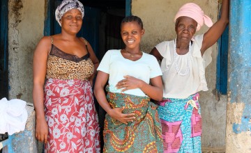 Pregnant woman with family