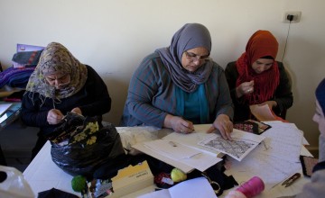 Stitching at an embroidery workshop in Lebanon supported by Concern. Credit: Abbie Trayler-Smith/Concern