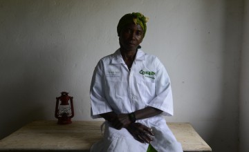 Delphine Kowene, 44 inside the Boudouli Health Post, Central African Republic. Delphine has received training from Concern in Community Management of Acute Malnutrition (CMAM), IMCI, Infant and young child feeding (IYCF), Participatory Hygiene and Sanitat