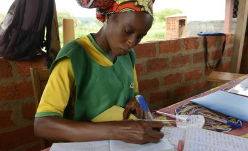 Gladys Doro-Nzerintou, 28, is working as Community Health Volunteer at the Boyali Health Post where she has learnt about childhood illnesses and how to screen children to spot the signs of malnutrition.Photo: Chris de Bode/Panos Pictures for Concern World