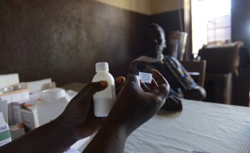 Mum Aline is given antibiotics for three-month-old Roger to treat his pneumonia. Photo: Chris de Bode/Panos Pictures for Concern Worldwide