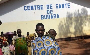 Aline eventually arrives at Burara Health Centre after walking barefoot for an hour, cradling little Roger close to her. Photo: Chris de Bode/Panos Pictures for Concern Worldwide
