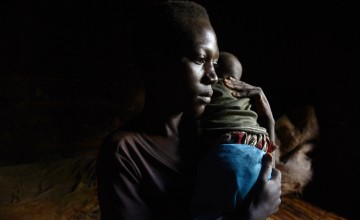 Aline Nsabimana is worried about her three-month-old son Roger – her only child, after a fever broke out and he began coughing during the night. Photo: Chris de Bode/Panos Pictures for Concern Worldwide