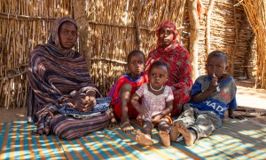 Didja, her sister and her children in a refugee camp in Chad 
