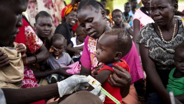 People gather for a Concern Worldwide nutrition clinic, South Sudan. Photo: Abbie Trayler-Smith