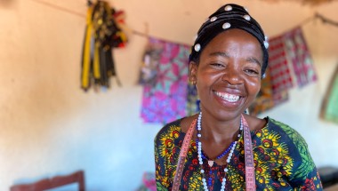 Alexia Mukashyaka runs a successful tailoring business in a small workshop in her village, after partnering with Concern.