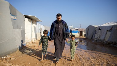 Man with children in Syria