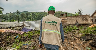 Concern staff check the progress of the latrine construction in the Mungote refugee camp, DRC