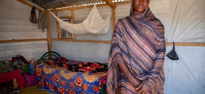 Dijda in her home in a refugee camp