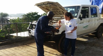 A routine service in Sierra Leone with the Assistant Transport Officer, Samuel Serry, and the EU Aid Volunteer, Anne Vazzoler. Photo: Mohamed Ameen Bah/Concern Worldwide.