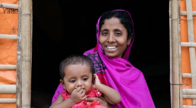 *Noor Fatima with baby daughter *Laila (9 months). Noor and her family fled violence in Myanmar and are now living in a camp in Bangladesh. They have received emergency assistance from Concern, funded by the Disasters Emergency Committee. Bangladesh. Photo: Paddy Dowling/DEC/ Concern Worldwide