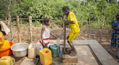 A Concern-constructed water point at Boyali in Central African Republic, which is now managed by the local community. The existing water source was protected from flooding and the access point raised for better access. Photo: Kieran McConville / Concern Worldwide