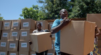 Workers load up trucks with supplies for the worst effect areas of the Nsanje Region. Photo: Gavin Douglas/ Concern Worldwide