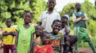 Three of Natalie Wato's children - Davilla, Patricia and Gaus with their friends from the village of Gbatin. Photographer: Darren Vaughan