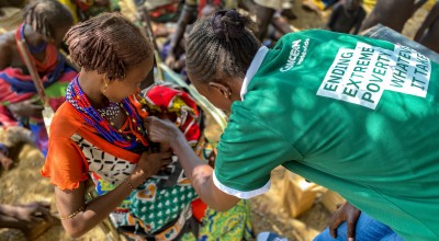 Concern nurse Beatrice welcomes mothers and children at an outreach centre in rural Kenya. Photo: Jennifer Nolan