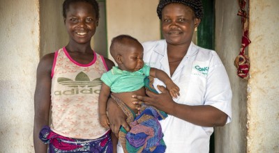 Matron Emielliene Mapouka (39) with six-month-old Rosalia and mum Hortense Mbolidere. Photo: Chris de Bode/Panos for Concern, CAR
