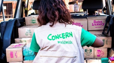 Concern employee Judith Cent distributing soap in Malawi.
