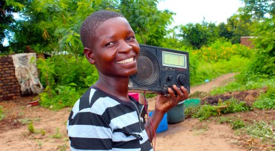 Grace, 26, with her radio at her home in Mlolo, Malawi. Photo: Jason Kennedy / Concern Worldwide