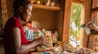 Eliza Manjolo, a beneficiary of Concern's 'Umodzi' Graduation programme in her shop in Nsanje, Malawi, April 2021. Photo: Chris Gagnon / Concern Worldwide.