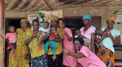 Mothers and nurses at a Peripheral Health Clinic in Magabana Community, Sierra Leone