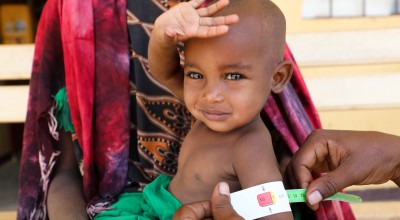 Halimo Hassan (1 year and 2 months) and mother Khayro Ali Hassan (30) in a remote health centre in Filtu, Somali Region. Halimo is being treated for severe acute malnutrition with the support of International NGO Concern Worldwide. Photo: Jennifer Nolan/ 