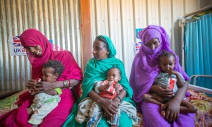Malaz feeds her two-year-old Aida ready-to-use-therapeutic food at her home in Kassala State. During the mass mid-upper arm circumference (MUAC) screening and referral for children under five, Aida was confirmed severely malnourished. She was very weak and immediately referred to Al-Arab health facility for treatment. Photo: Ahmed Elfatih Mohamdeen/UNICEF